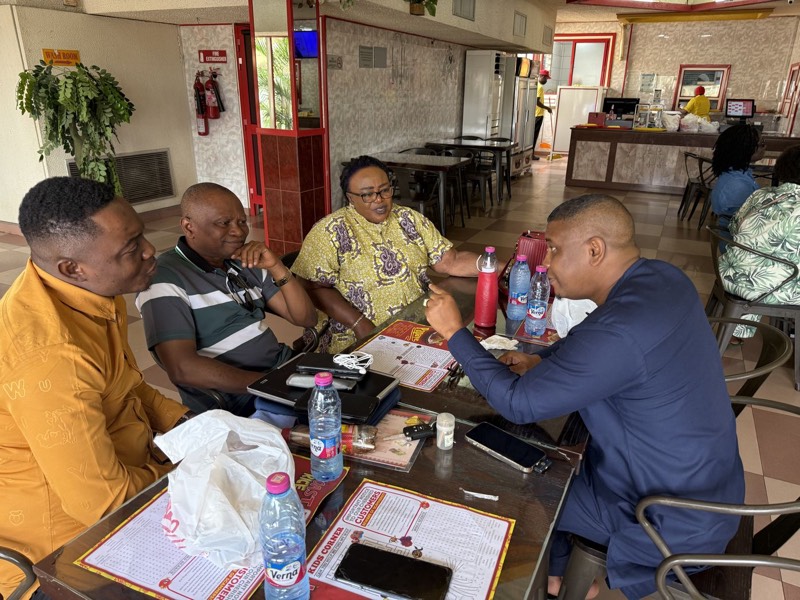 Leaders at a table with papers