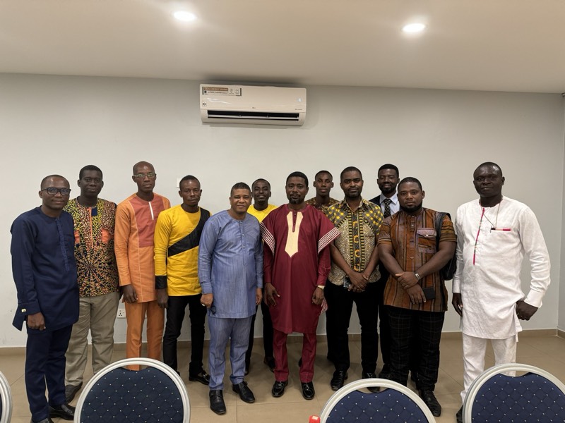 A group of men in traditional attire standing together