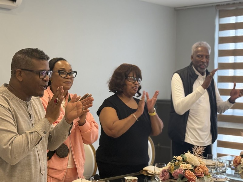 Four leaders applauding